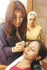 A soon-to-be bride gets her make-up done at Salochnas beauty world, Sector 8-A,Chandigarh
