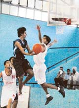 A match between Ludhiana and Muktsar in progress during the 56th Senior Punjab Basketball Championship at Guru Nanak Stadium in Ludhiana on Friday