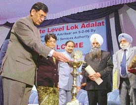  Mr Justice Y.K. Sabharwal, CJI, inaugurates a seminar on Lok Adalats at Amritsar. Of the 23,781 cases put up before a Special Lok Adalat in Amritsar, 13,467 were settled.