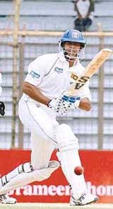 Sri Lankas opening batsman Michael Vandort plays a shot during the fourth day of the first Test against Bangladesh in Chittagong on Friday