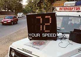 A screen mounted on an interceptor police vehicle displays the speed of a car, in Chandigarh on Sunday