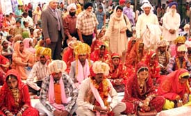 Marriages of 19 poor girls being solemnised at Nishkam Seva Ashram, Daad village, on Sunday