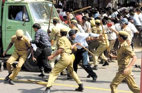 Traders and shopkeepers, who were protesting against the sealing of shops in residential areas of Delhi, were lathicharged by the police at Parliament Street in the Capital