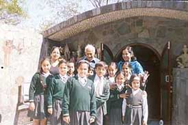 Students of the junior wing of St Xaviers, Mohali, with Mr Nek Chand at Rock Garden in Chandigarh on Tuesday.