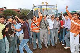 Students block a bus at the Panchkula bus stand on Tuesday. 