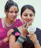 Students of Guru Nanak Girls College get ready for Ms Farewell contest at the school in Ludhiana on Friday