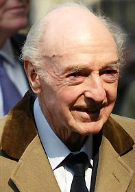 Former Conservative Party Secretary of State for War John Profumo arrives at a Service of Thanksgiving for Lord Jenkins of Hillhead at Westminster Abbey in London in this March 27, 2003 file photo