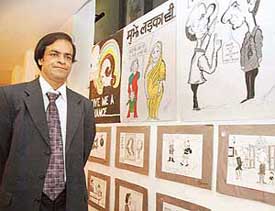S.C. Bhattacharya with his cartoons at the Fun Republic in Mani Majra on Saturday.