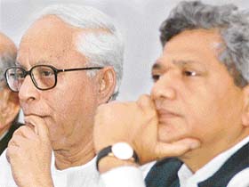 West Bengal Chief Minister Buddev Bhattacharya and CPM General Secretary Sitaram Yechury during a Press conference at the Press Club of India in New Delhi