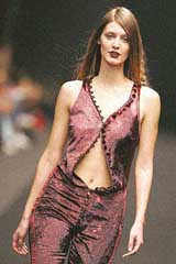 A model presents a creation by Serbian designer Aleksandar Protich at the Autumn Winter, 2006, Lisbon Fashion Week show.