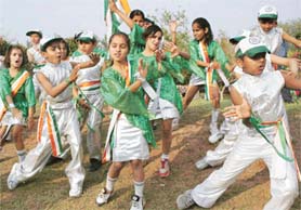 Students of Satluj Public School perform a patriotic dance.