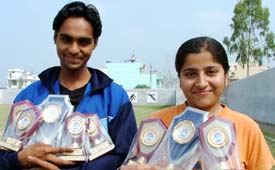 Sukhraj Singh and Amandeep Kaur, who have been declared the best athletes