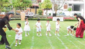 Children take part in games held at Saplings Nursery School, Rajguru Nagar, Ludhiana, on Sunday
