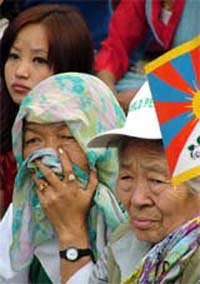 Tibetan refugee women pay homage to those women who lost their lives on this day in the 1959 Tibetan women's protest against the Chinese occupation of Tibet, in New Delhi