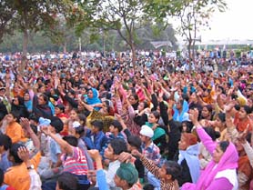 The families of the RCF employees protesting against the proposal of converting the factory into a PSU, in Kapurthala on Monday. 
