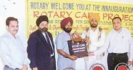 A function organised by the Kharar Rotary Club to start Rotary Care project in Kharar on Monday.