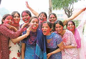 Holi Hai Bhai Holi Hai ! Girls of the Khalsa College for Women splash colours on one another in Ludhiana on Tuesday.