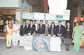 Students of Swami Ram Tirtha High School in the market during a campaign against polybags in Mohali on Thurdsay.
