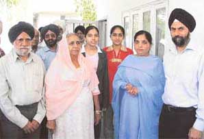 Mr Paramjit Singh and Ms Gurcharan Kaur (right), parents of England cricket player Monty Panesar, who visited Montys grandparents in Ludhiana on Thursday.