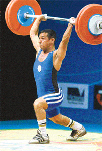 Vicky Batta performs a lift in mens weightlifting at the Commonwealth Games in Melbourne on Thursday
