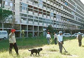 A bomb disposal squad scans the complex of the Punjab and Haryana Civil Secretariat after a hoax call in Chandigarh on Friday.
