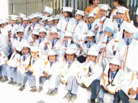 Tiny tots at their "graduation ceremony" at Sat Paul Mittal School in Ludhiana on Friday