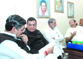 MP Jagdish Tytler, MLA S.C. Vats, MP Sajjan Kumar, DPCC president Ram Babu Sharma and MP Krishna Teerath attend a meeting to discuss MCDs demolition drive in the Capital on Saturday.