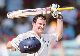 Englands Andrew Strauss celebrates on completing a century in the third Test against India at the Wankhede Stadium in Mumbai on Saturday