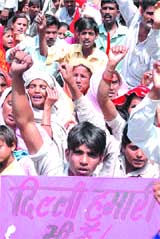 Jhuggi dwellers protesting against the demolition of their jhuggies at Jantar Mantar in the Capital on Tuesday