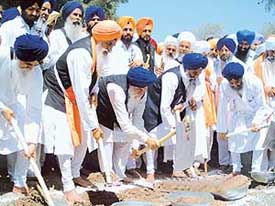 SGPC president Avtar Singh Makkar kickstarts work to broaden passage to Takht Sri Damdama Sahib at Talwandi Sabo on Tuesday. 