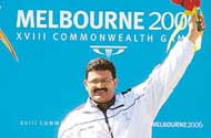 Samaresh Jung during the medal ceremony after he won the gold medal in the mens 50m pistol event, in Melbourne on Tuesday