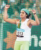 Indias silver medallist Seema Antil celebrates after a throw during the womens discus throw final at the Commonwealth Games in Melbourne on Tuesday