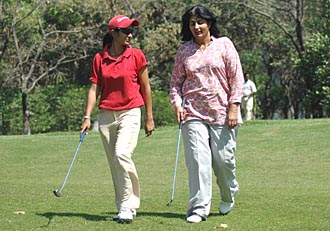 Kanika Minocha, the leader, with her mother Dimple Minocha, who is also participating in the Chandigarh Open Ladies Amateur Golf Championship at the Chandigarh Golf Club on Wednesday.