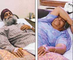 Hardyal Singh; and  Amarjit Kaur recuperate after being treated for poisoning at a hospital in Ludhiana