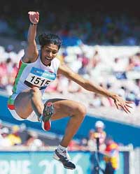 Anju Bobby George jumps as she competes in the womens long jump qualifying round at the Commonwealth Games in Melbourne on Wednesday