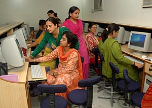 Teachers of DAV Model School, Sector 15, attend a computer workshop on the school campus in Chandigarh on Thursday.