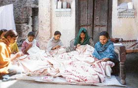 Arpana's women decorating clothes