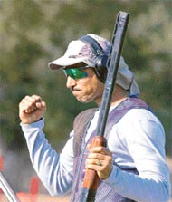 Rajyavardhan Singh Rathore reacts during the mens double trap event, where he won the gold, at the Commonwealth Games in Melbourne on Thursday