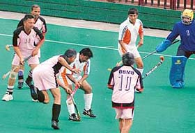 A hockey match in progress between the BBMB and the MP State Electricity Board at the hockey stadium in Sector 42, Chandigarh