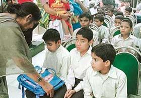 School bags being given to students of the Institute for Blind launch during the launch of VIP bags at Sector -19, Chandigarh