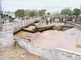 The damaged bridge on the Sidhwan canal near Gill village