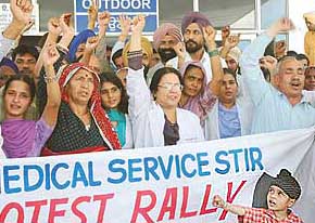 Members of the Doctor-Public Joint Action Committee protest in support of their demands at the Mata Kaushalya Hospital in Patiala on Wednesday.