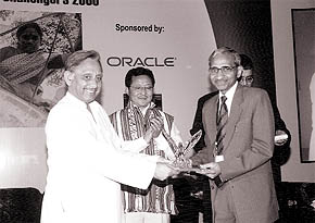 Mr B.M. Mittal, Chief General Manager, PNB, receives the Skotch award for change management from Minister for Panchayati Raj and Sports Mani Shankar Aiyar on Tuesday