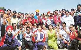 Winners of the FCI sports meet pose for a photograph at the Sports Complex, Sector 46