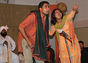Life is a stage: Artistes of the Rangh Sangh theatre group presenting a play in Jalandhar. 