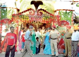 Devotees throng Durga Mata Temple, Jagraon bridge, on the occasion of first day of Navratras on Thursday