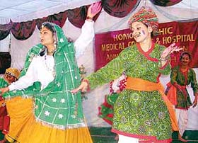 Students present a dance item during the annual day function of the Homoeopathic Medical College and Hospital, Sector 26, Chandigarh