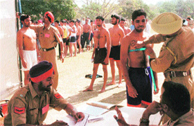 Candidates from the four districts in Doaba region undergo physical fitness tests at a police recruitment drive in Jalandhar on Friday