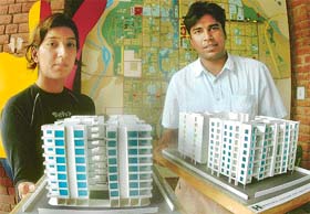 Final-year students of Chandigarh College of Architecture, Chandigarh, with the Haryana Housing Board apartment models