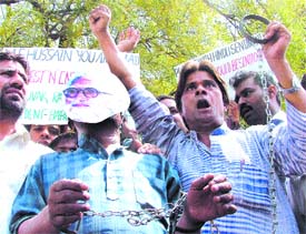 Congress workers under the banner of Navyuvak Rajput Sangathan protesting against M. F. Hussain for drawing naked paintings of Hindu gods, at Jantar Mantar in the Capital on Sunday